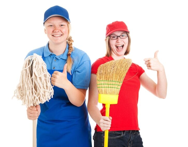 two teens working with thumbs up