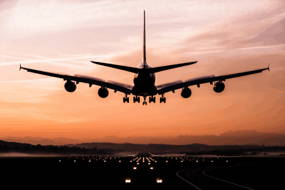 Airplane landing in the evening