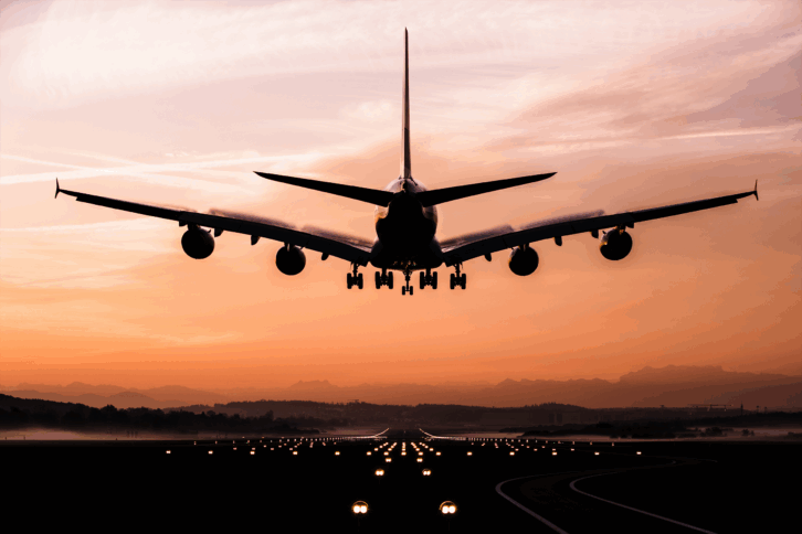 Airplane landing in the evening