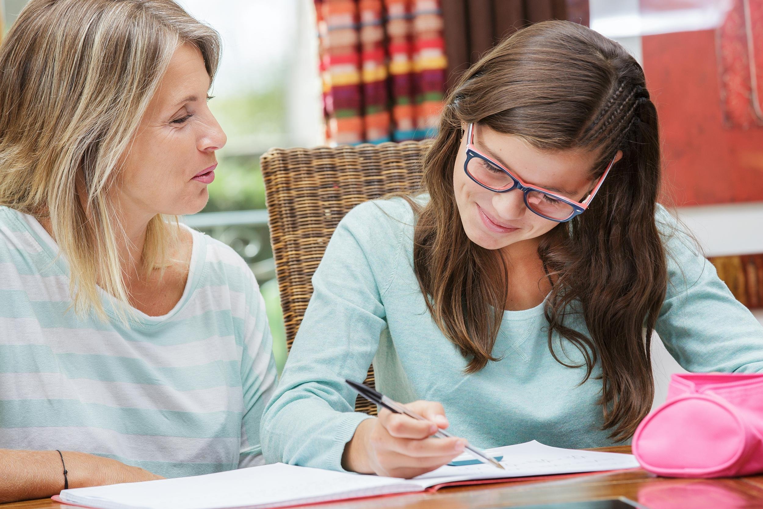 tutor teaching teen