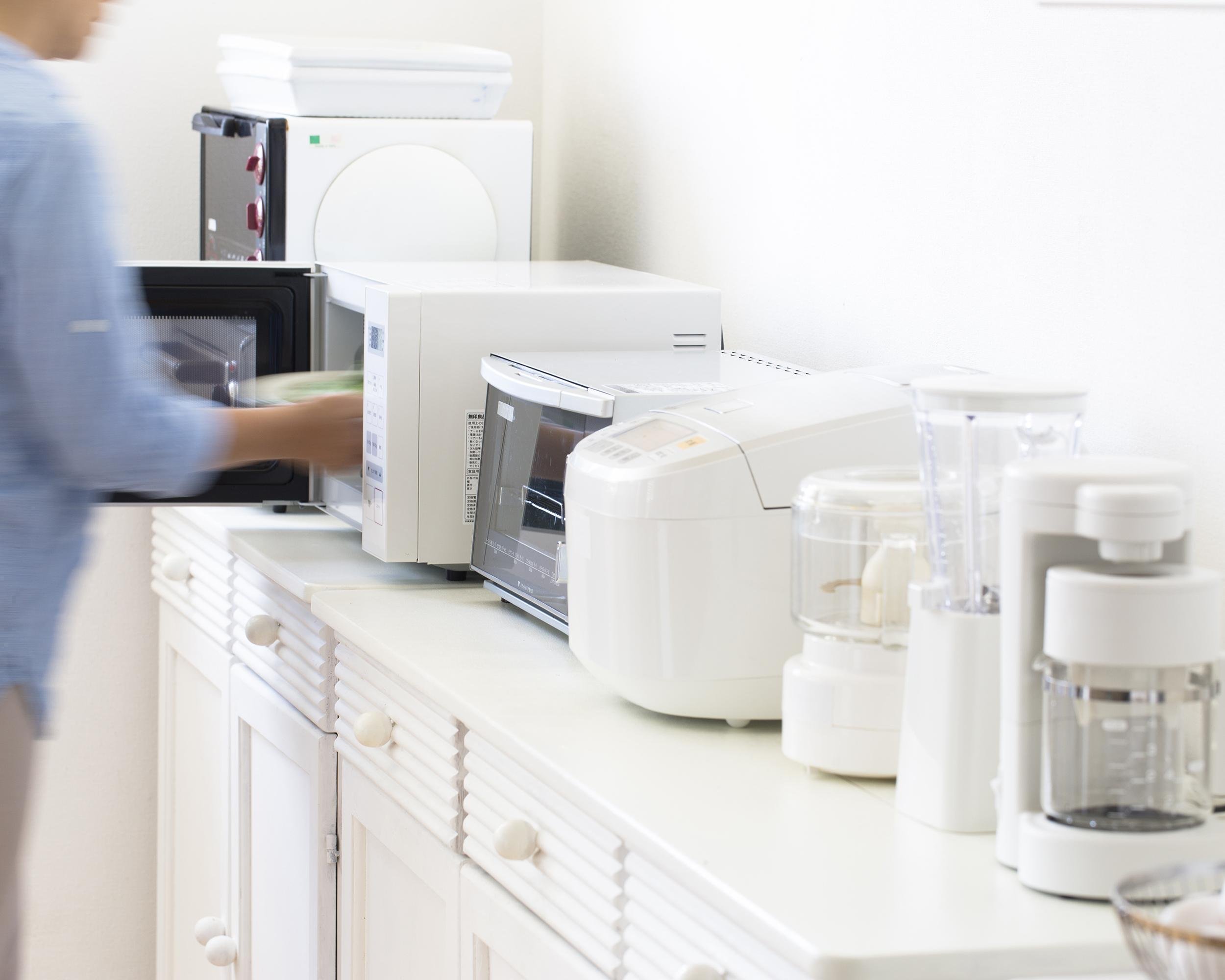 row of kitchen appliances on countertop