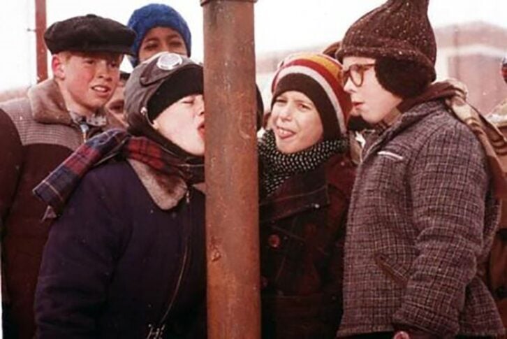 Image from the film A Christmas Story of Flick sticking his tongue to the flagpole.