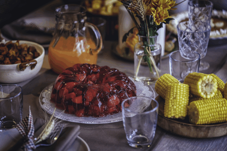 Holiday table with corn and jello salad