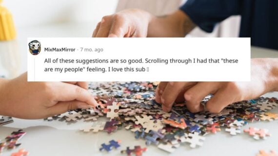 Detail of hands looking for puzzle pieces