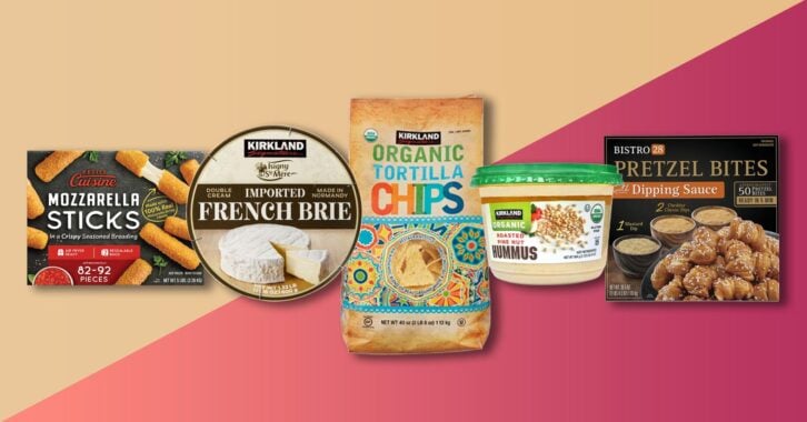 A grouping of cutout Costco party foods against a tan and deep red gradient background. Products include mozzarella sticks, pretzel bites, hummus, brie, and tortilla chips.