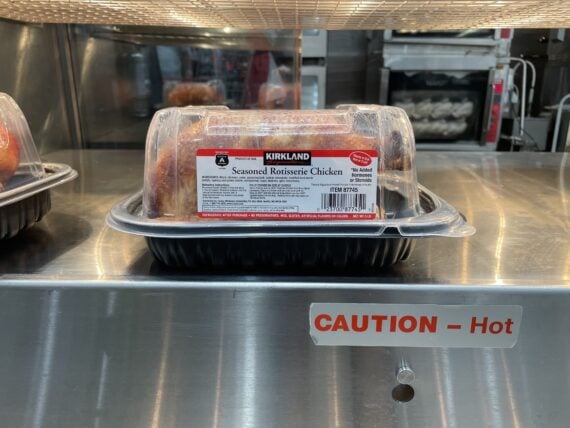 Costco rotisserie chicken on a shelf