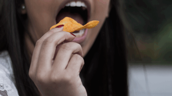 Eating a Doritos chip