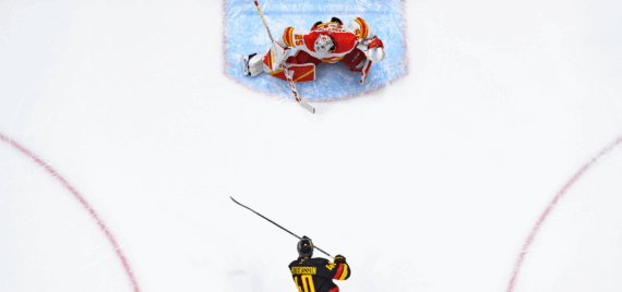 Elias Pettersson #40 of the Vancouver Canucks scores a goal on Jacob Markstrom #25 of the Calgary Flames during the first period of their NHL game at Rogers Arena on April 8, 2023 in Vancouver, British Columbia, Canada