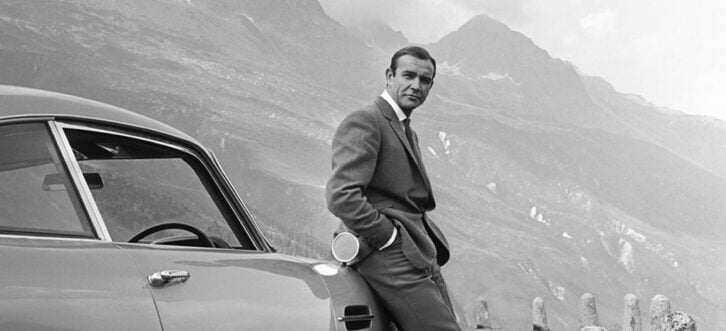 1964: Actor Sean Connery poses as James Bond next to his Aston Martin DB5 in a scene from the United Artists release 'Goldfinger' in 1964.