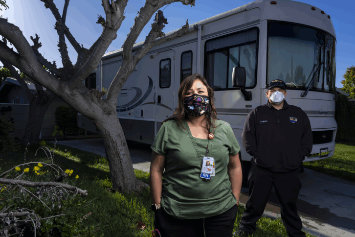 Lisa Magallanes, 39, has been an ER nurse since 2015. She is seen with her son Jimmy who is a recently qualified EMT. They are both socially isolating from their family in a donated RV while they deal with treating Covid-19 patients.