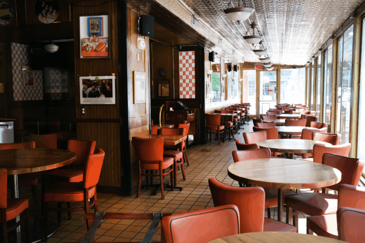A restaurant stands empty and closed in a shuttered business district in Brooklyn on May 12, 2020 in New York City