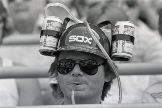 Baseball Fan Wearing Double Beer Hat in the late 1900s