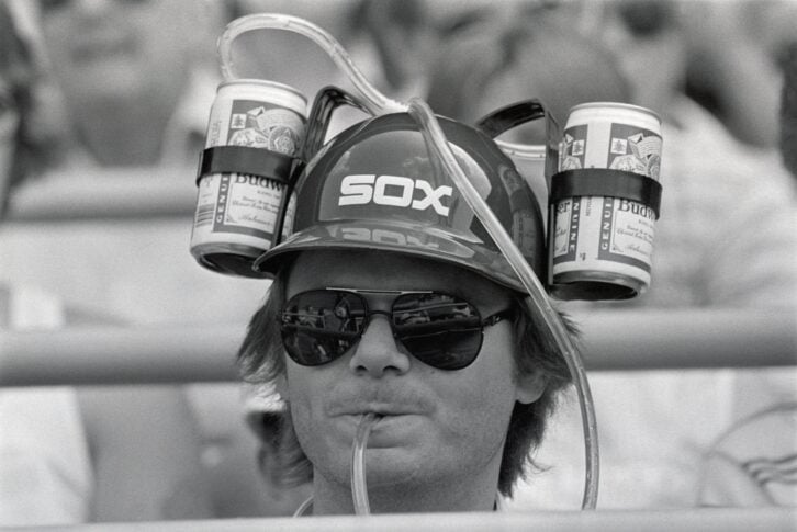 Baseball Fan Wearing Double Beer Hat in the late 1900s