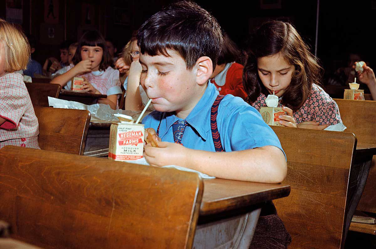 Children Eating Lunch at Desks 1950