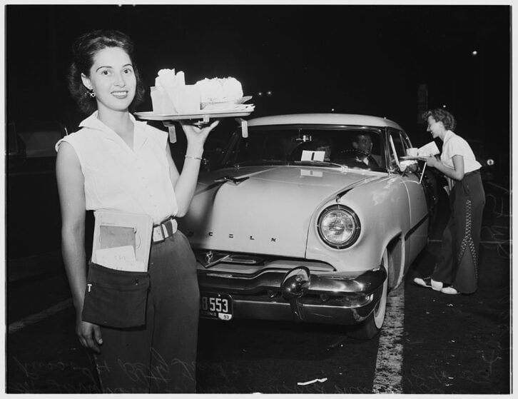 Night jobs feature, carhops, at Carl's Junior, figueroa Street and Flower Street, Terry Perry, 23 years (carhop), Miss NMildred Macut (customer), Lou Russo (customer), Betty Trent, 22 years (caphop), Kitty Brenner (customer), Mr and MrsDean Center, LA