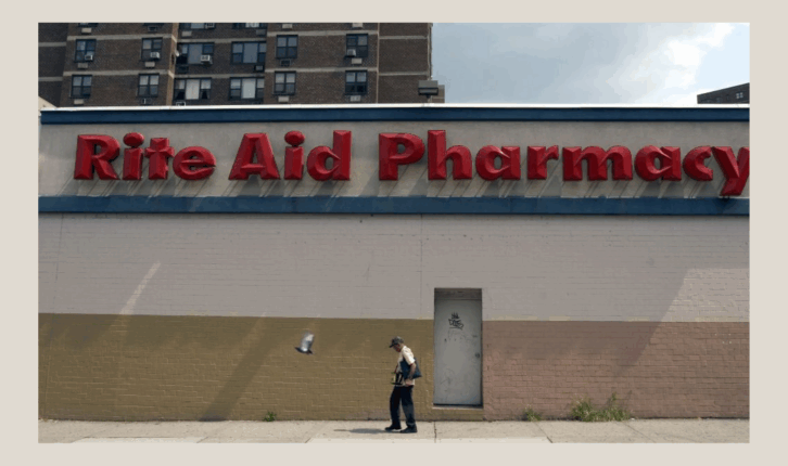 Pedestrians walk by a Rite Aid Pharmacy on Grand Street in Manhattan August 24, 2006 in New York City. Rite Aid Corp. announced Thursday it will purchase the U.S. Eckerd and Brooks operations of Canada's Jean Coutu Group Inc. for about $2.55 billion in ca