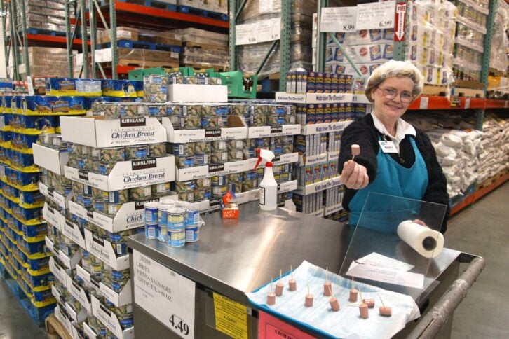 Mary LaRocca offers a sample of Libby's Vienna Sausage in a Costco Wholesale store March 8, 2002 in Niles, IL