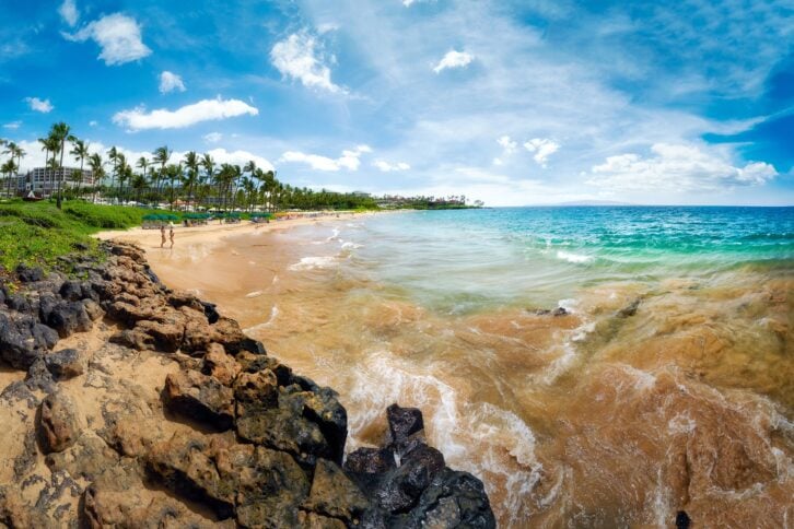 tourists and visitors visiting the beautiful white sand beach of Wailea