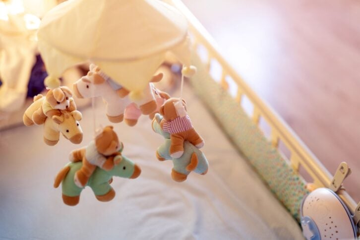 Close-up of mobile in baby crib
