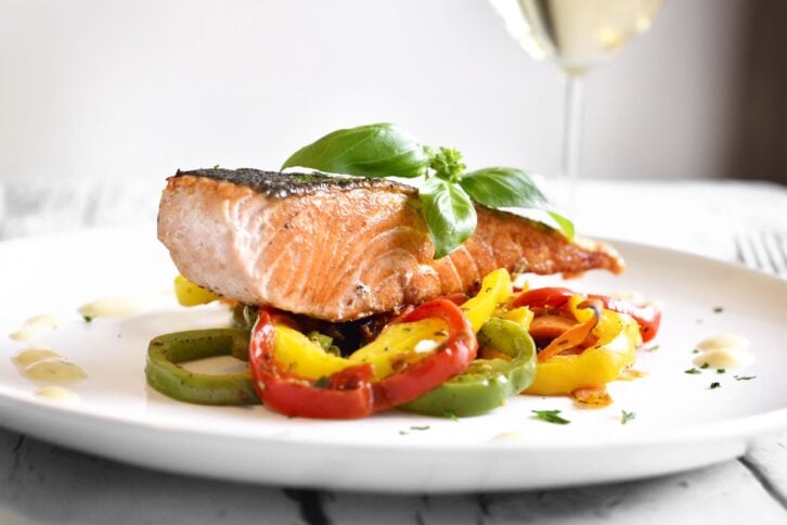 Salmon and peppers at restaurant