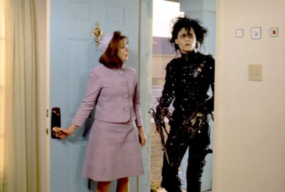 American actors Dianne Wiest and Johnny Depp on the set of Edward Scissorhands, Wiest is opening the door and Depp is walking through it
