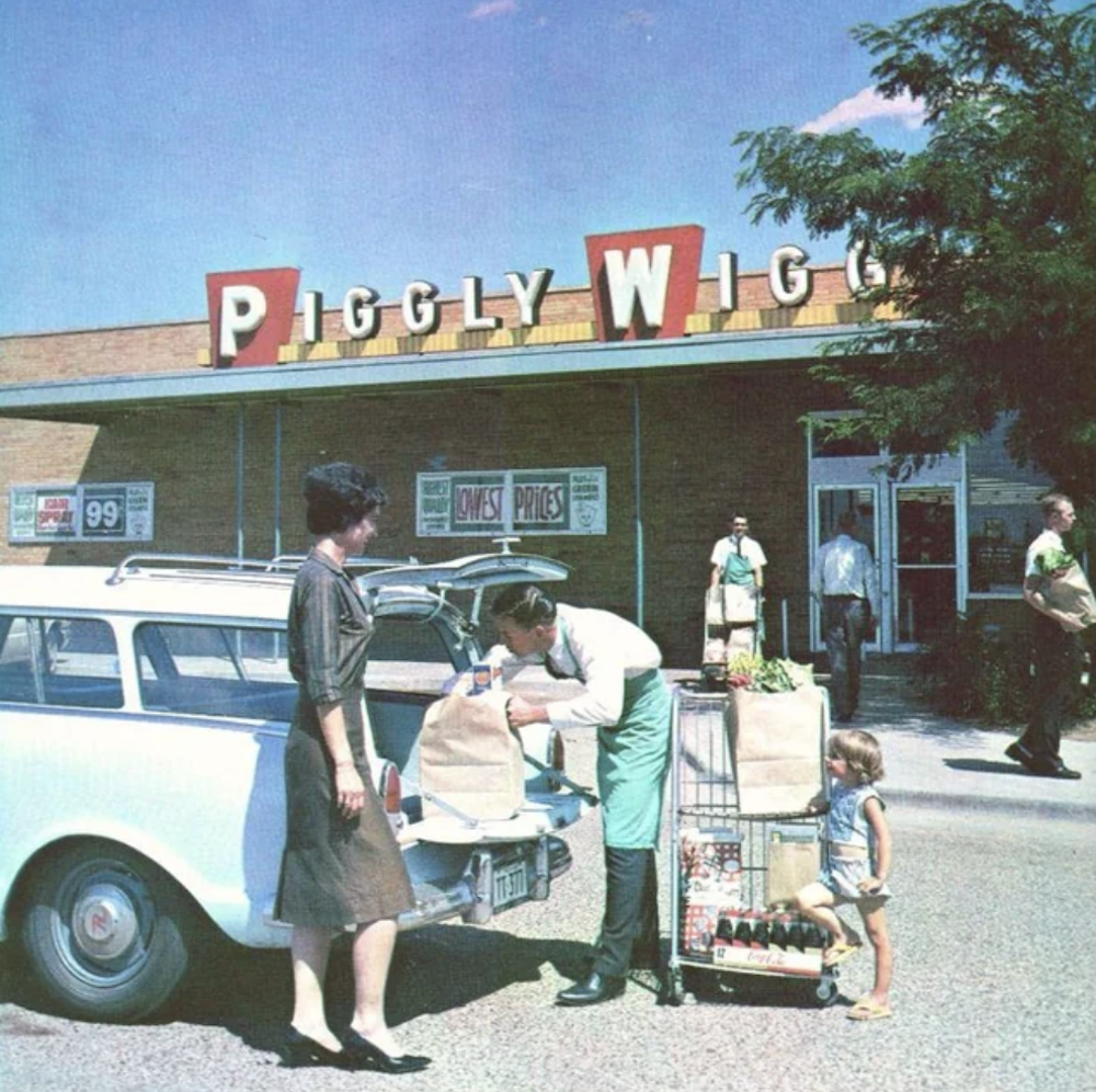 Mother shopping with daughter at Piggly Wiggly, circa 1960s