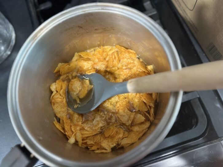 potato chips in pot on stove