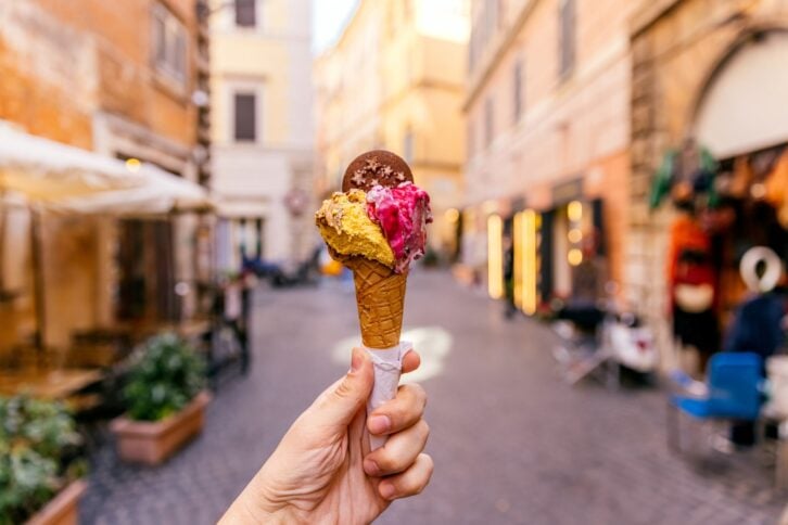 Person holding gelato in Rome, Italy