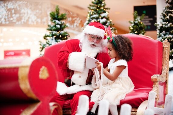 Shopping Christmas with family and Santa Claus at Shopping Mall