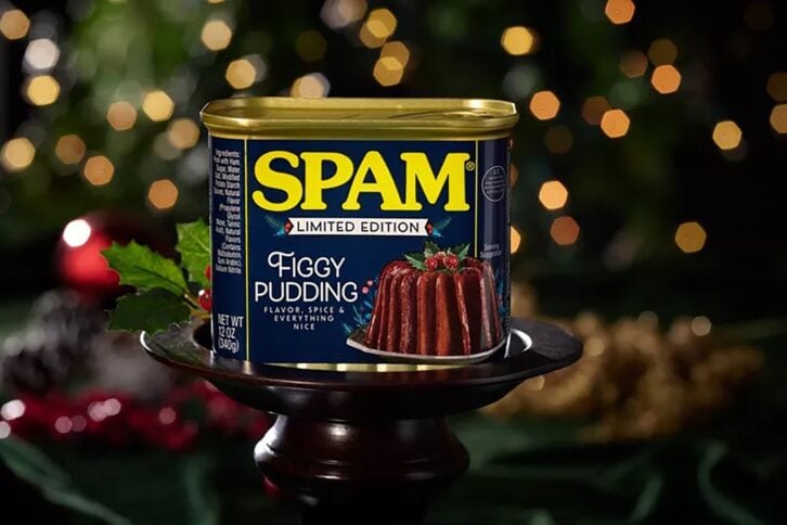 Spam figgy pudding with a Christmas tree in the background