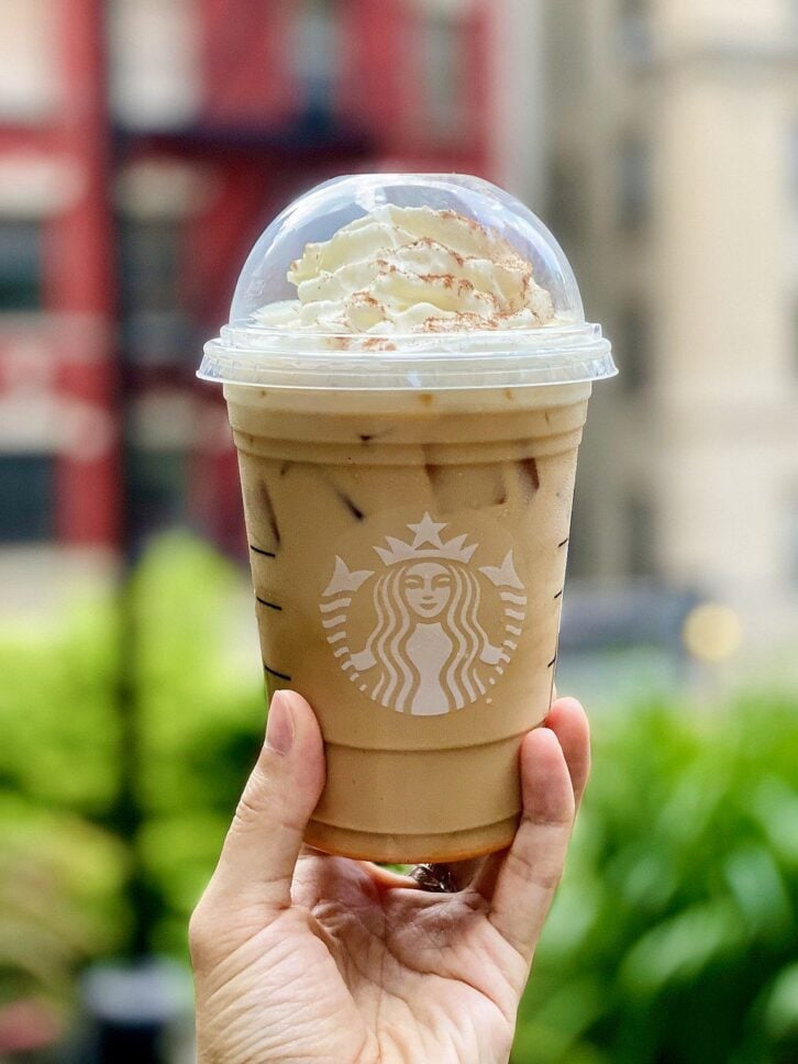 A grande iced pumpkin spice latte bought from a Starbucks store in New York City, New York, United States on August 26, 2021