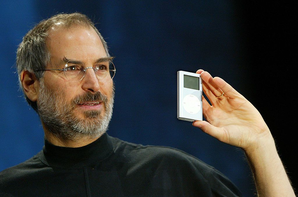 Apple CEO Steve Jobs holds a new mini iPod at Macworld January 6, 2004 in San Francisco