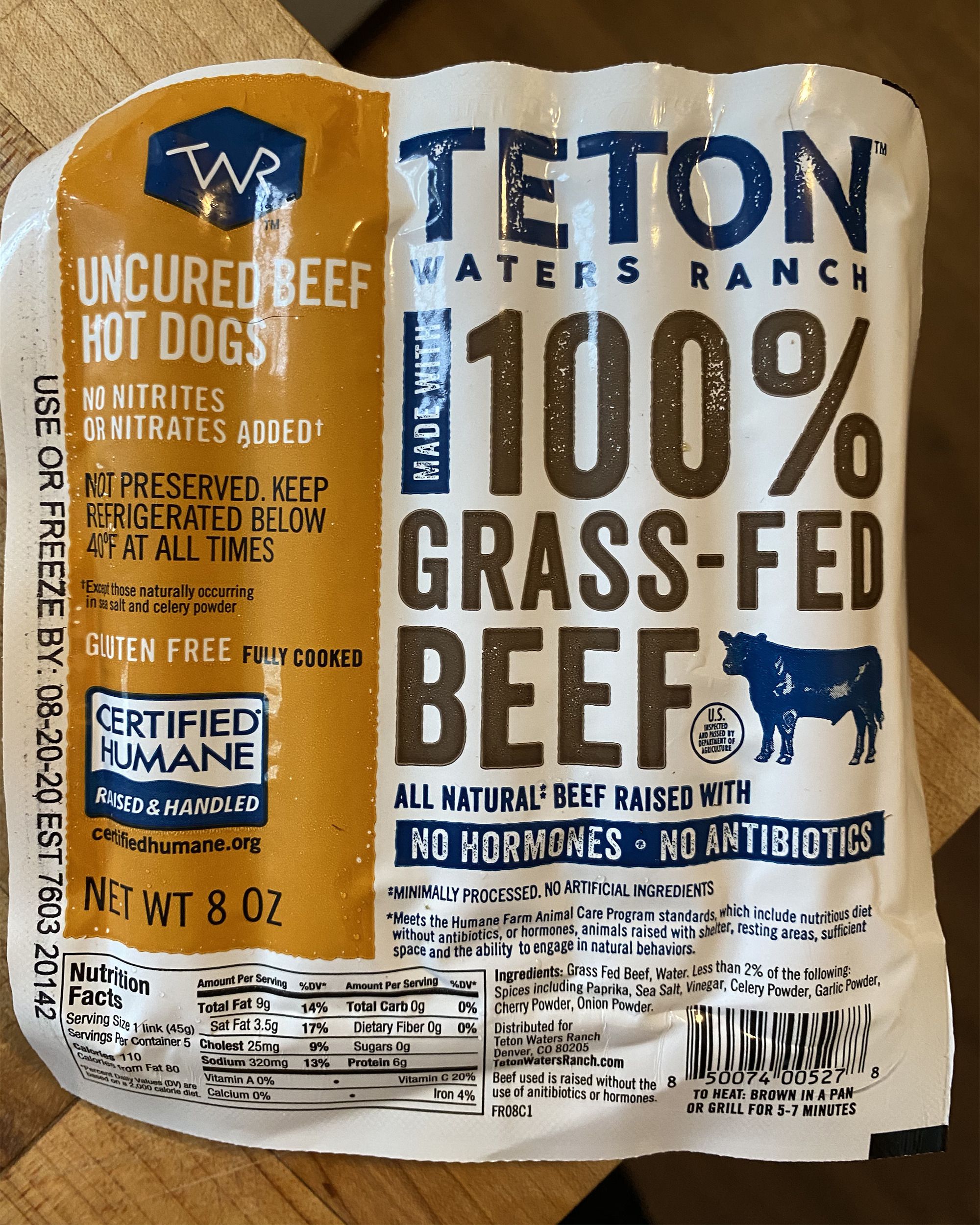 closeup of Teton Waters Ranch 100% Grass-Fed Beef Hot Dogs on table