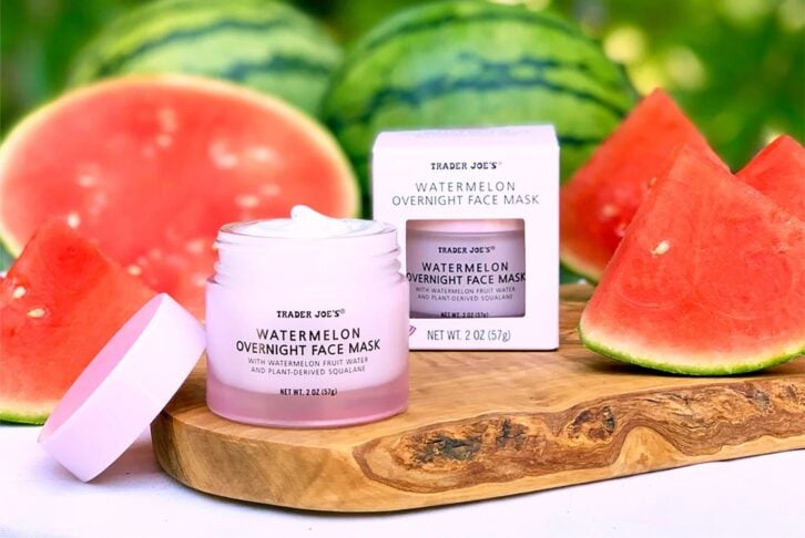 Staged photo of two jars of Trader Joe's watermelon face mask next to watermelon