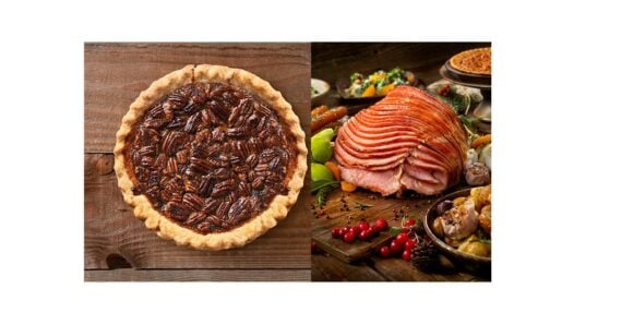 A pecan pie placed next to a holiday ham.