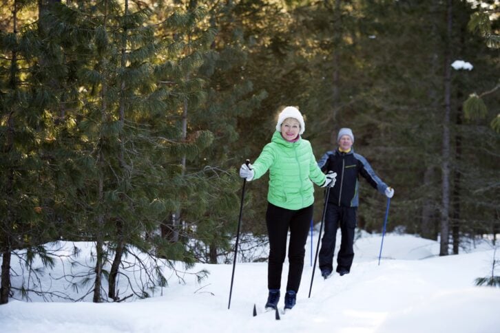 Senior couple cross country skiing