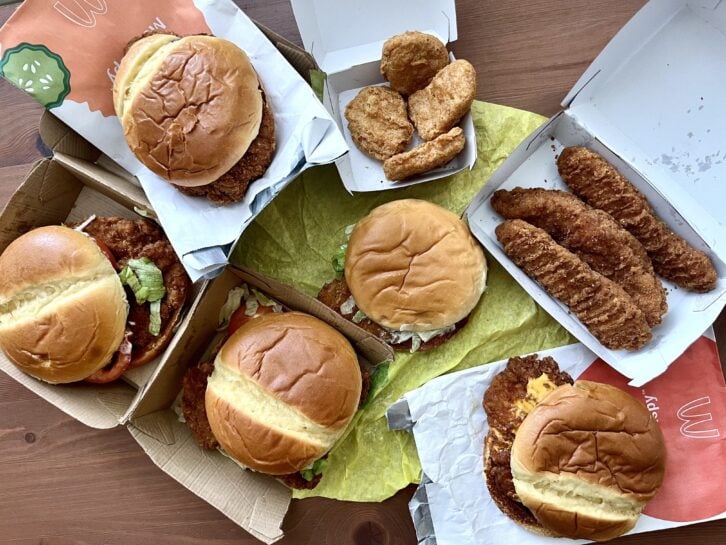 five fried chicken sandwiches, chicken mcnuggets, and chicken mccrispy strips from mcdonald's