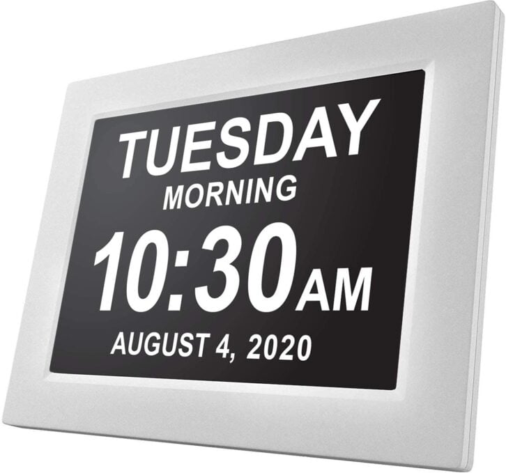 Digital calendar clock with large display of day, date, and time.