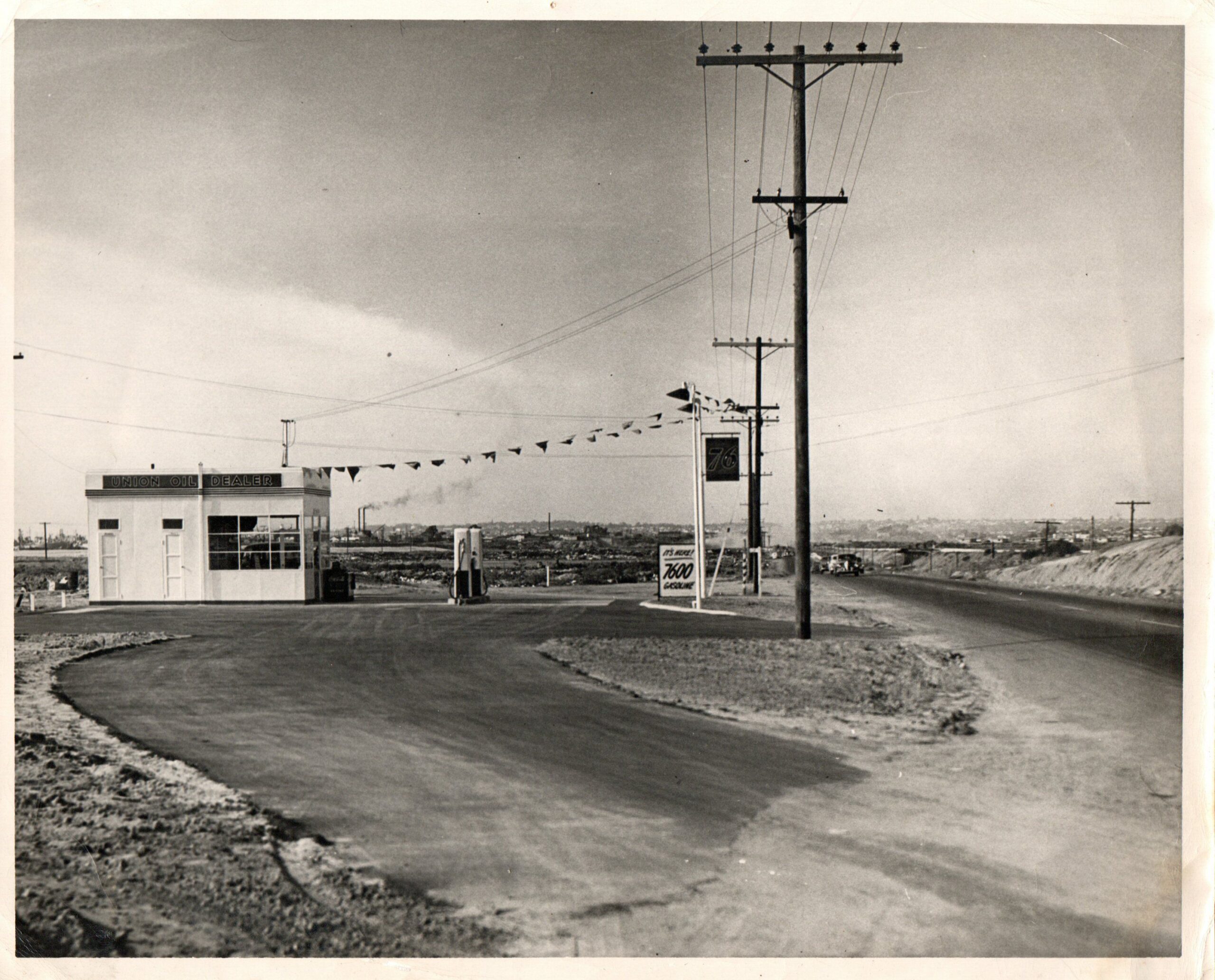 Grandpa's gas station, late 1940's, corner of Bay Blvd & E St, Chula Vista. Wish I knew which direction the photographer was facing.