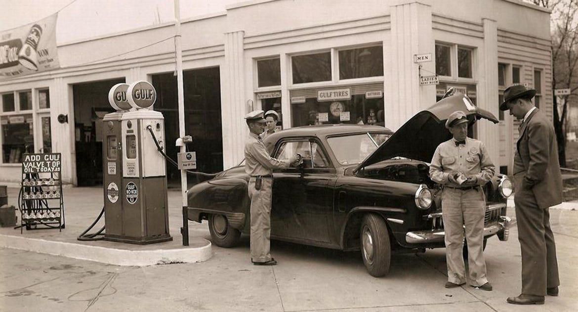 Gulf station from the 1950’s checking out a Studabaker. Unknown location. Back in the 1950s, it was common to see all employees wear uniforms and bow ties at your local gas station.
