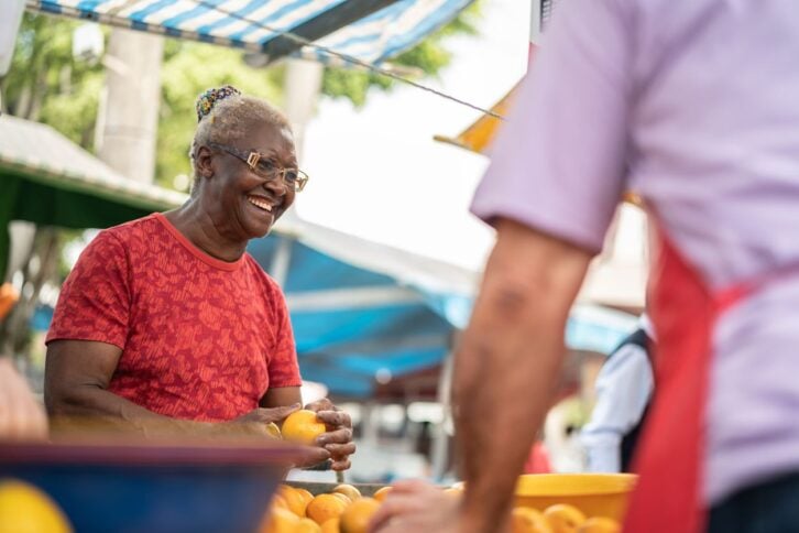 senior woman at farmer's market