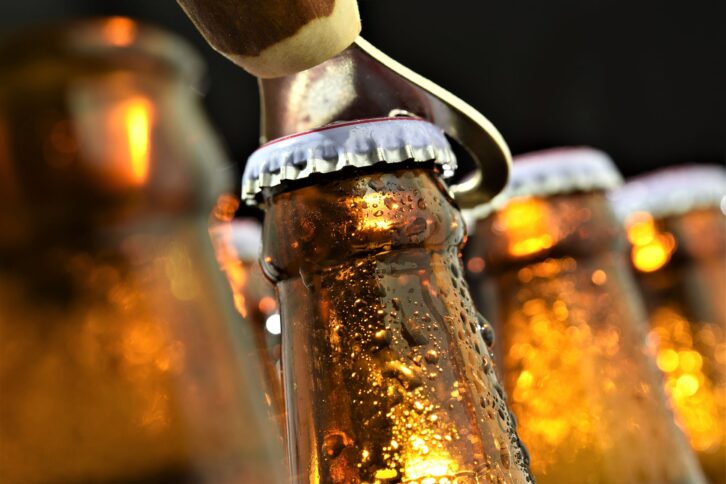 opening beer bottle