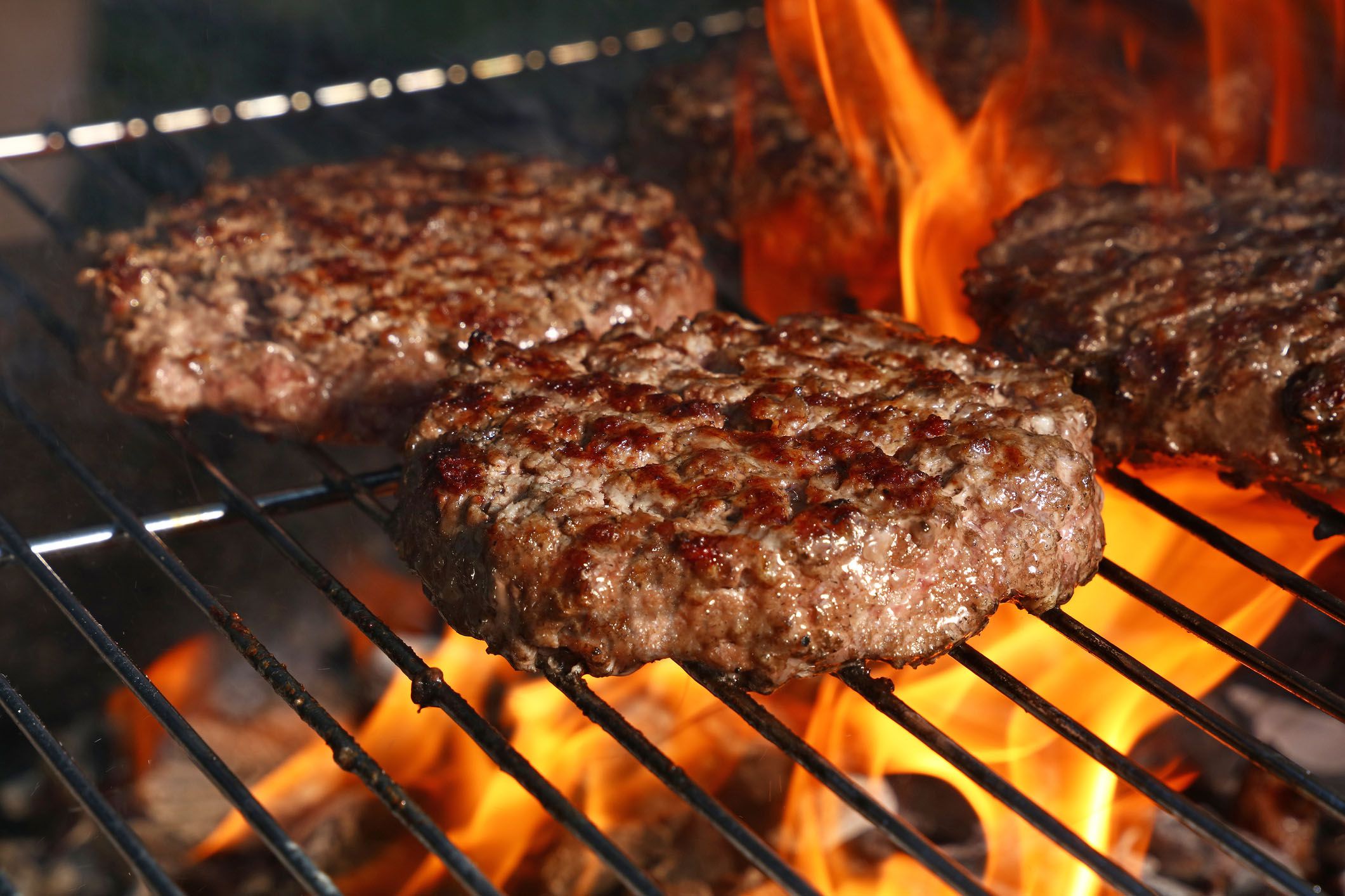 hamburger patties on grill