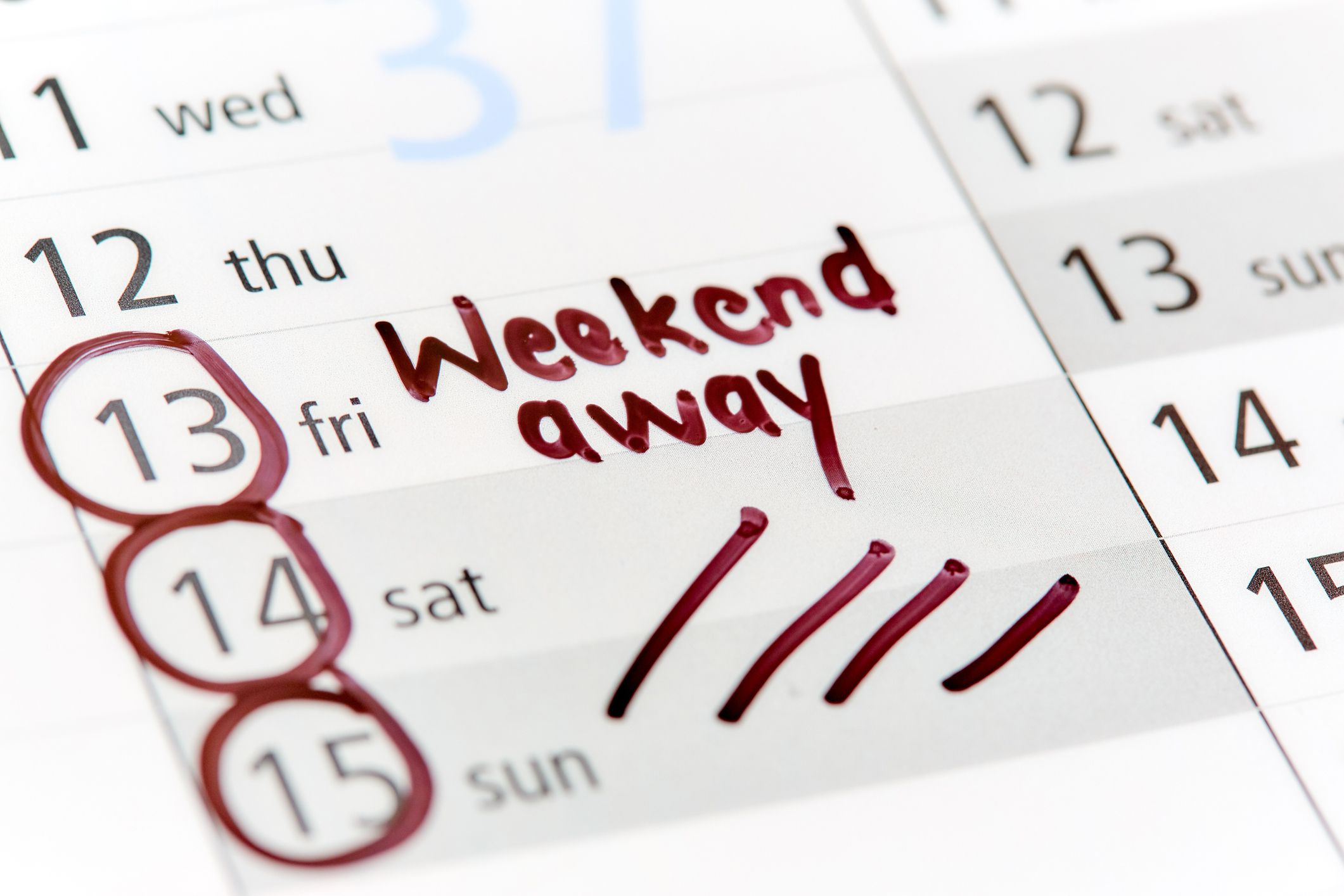 a calendar has a 3-day weekend marked out and circled and labeled weekend away