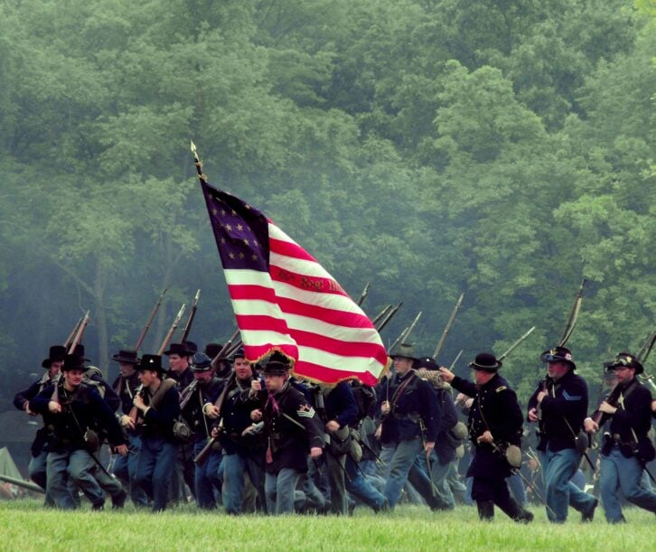 Civil War reenactment Lakewood Forest Preserve Wauconda Illinois. Picture taken on 07/09/16. Confederate troops are charge Union troops in the battle of Antietam (Also known as Sharpsburg) originally fought on 08/27/1862 in the great state of Maryland.