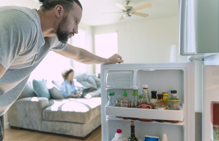 The group of millennials of different ethnicity, roommates, in their rental apartment in California, USA.