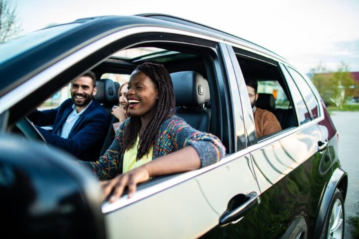 happy people in a car