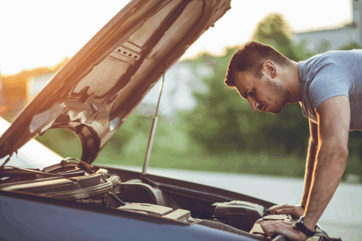 man having car problems