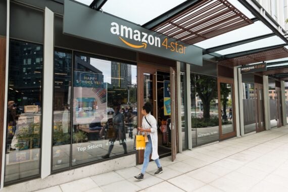 Seattle, USA - Aug 22, 2019: People outside the Amazon 4-star store mid day in the day in downtown.