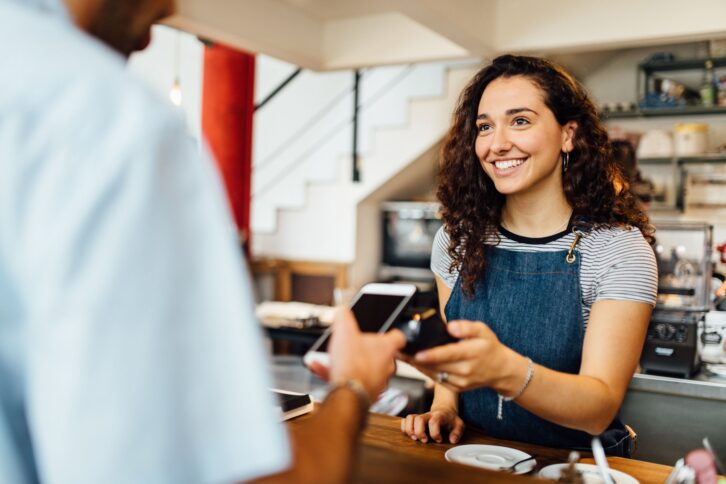 Client pays contactless at coffeeshop